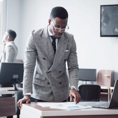 Two handsome cheerful african american executive business man at the workspace office